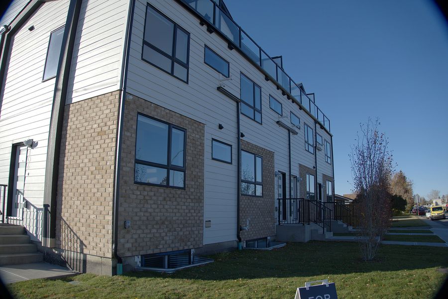 Re-cladding and exterior replacement, Calgary townhomes