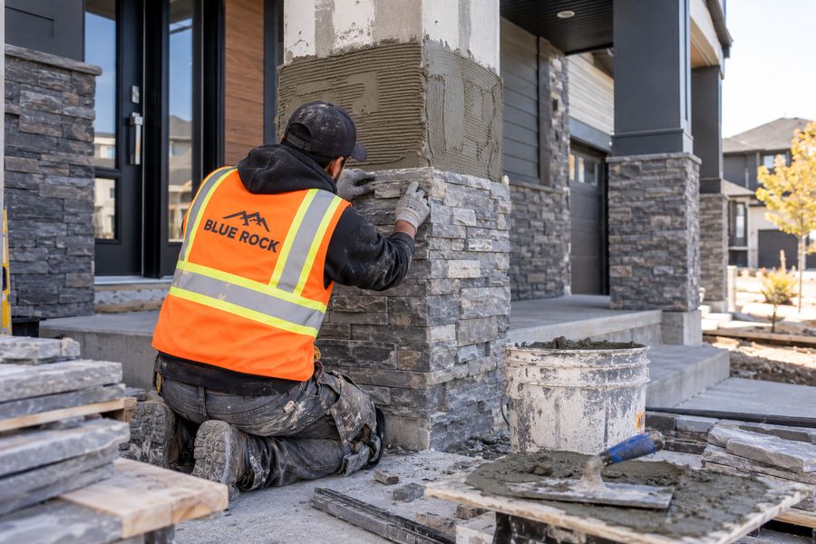 Stone veneer at entries and bases